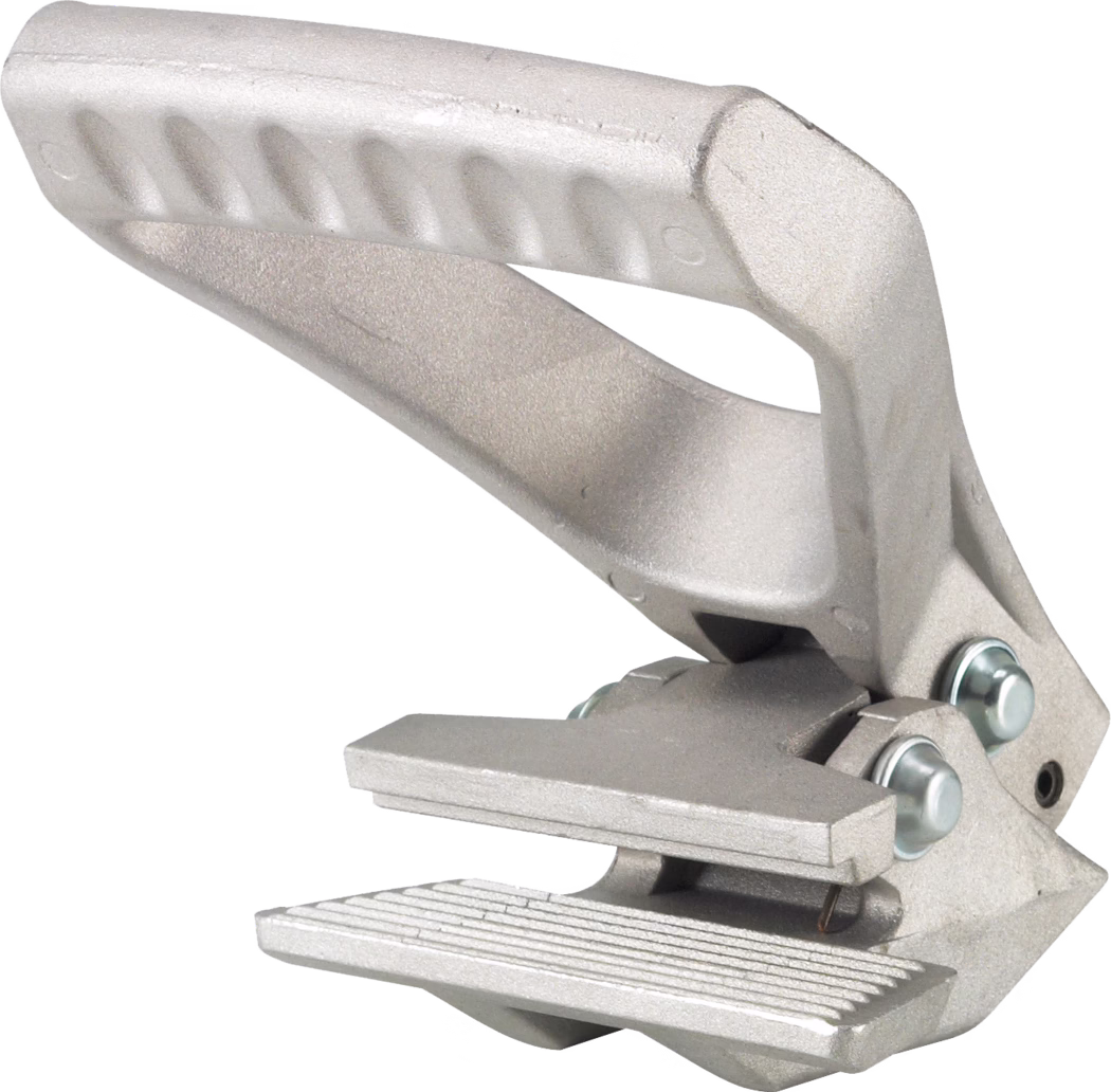 WOLFF_Dummy_13342_carpet clamp_2025-08 Close-up of a handheld single-hole paper punch made of silver-colored metal. The lever-style punch features a textured grip, a rectangular die, and two visible rivets at the hinge; designed to punch a single hole through sheets of paper.