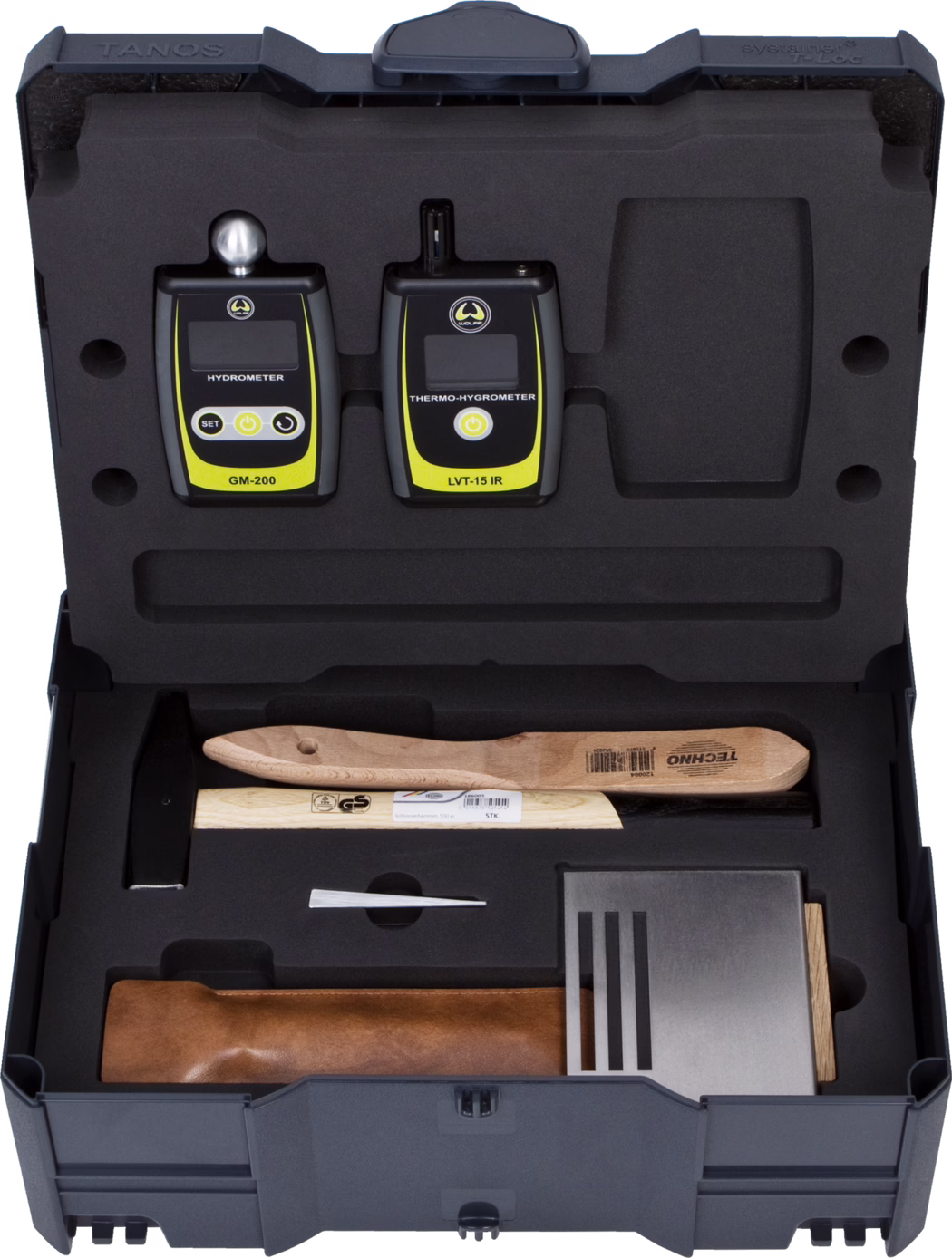 WOLFF_Dummy_79320_Substrate test kit_2025-08 Top-down view of a hard foam-lined carrying case showing two handheld electronic instruments seated in custom foam cutouts: on the left a GM-200 hydrometer with a small metal probe ball and the label 'HYDROMETER', and on the right an LVT-15 IR thermo-hygrometer with an infrared sensor and the label 'THERMO-HYGROMETER'. Both devices are predominantly black with bright yellow accent panels, small LCD screens and simple control buttons. The surrounding foam insert holds additional tools and accessories including wooden-handled tools, a small metal wedge, a rectangular metal plate with ventilation-like slots and a brown leather pouch; each item sits in a molded compartment that protects and organizes the kit for transport. The composition highlights the orderly layout, contrasting textures of foam, plastic, wood and metal, and clear product labeling.