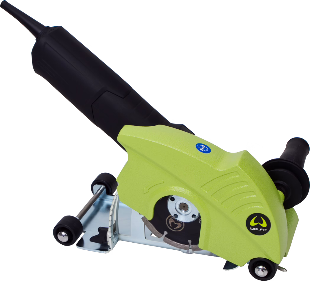 WOLFF_Dummy_68679_EF135 front_2025-08 Handheld electric cutter with lime-green protective housing, black rear handle, metal base plate, two small guide wheels and a circular diamond cutting blade; 'Wolff' logo visible.